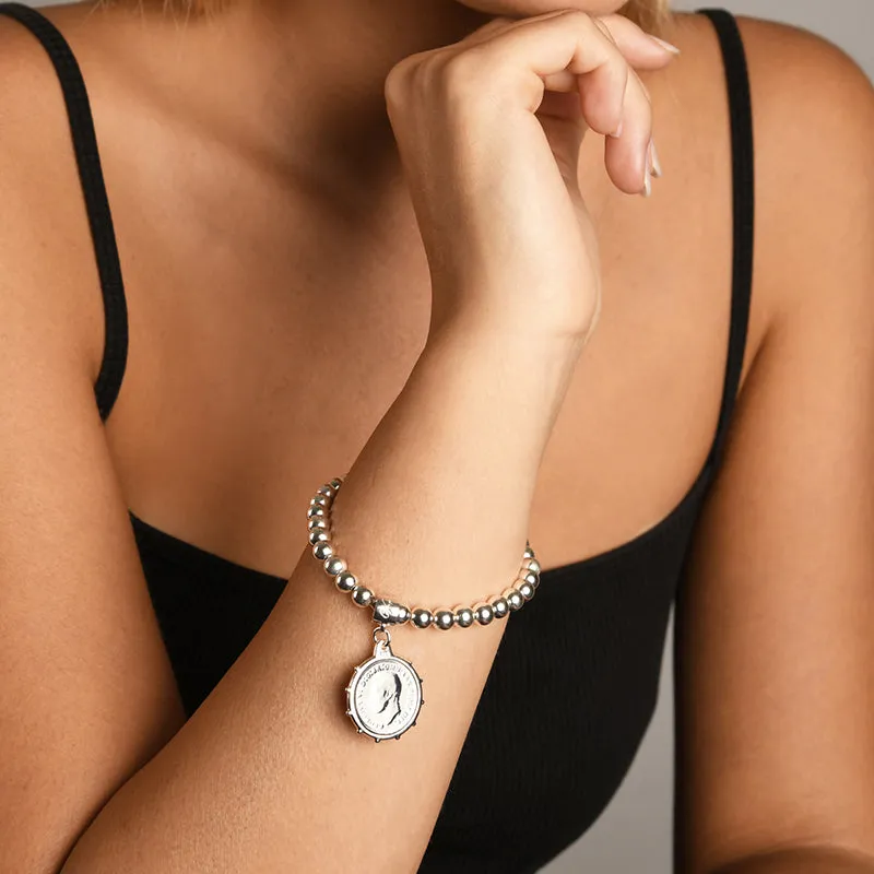 BALL BRACELET WITH ANTIQUE SIXPENCE
