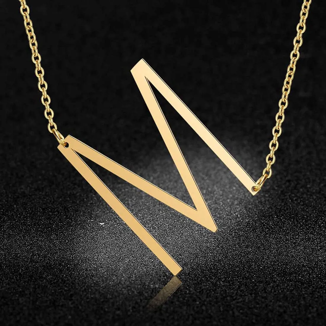 Yellow Chimes Latest Fashion Stainless Steel Gold Plated Initial Pendant with Alphabet M for Women and Girls (YCFJPD-ALPHBTM-GL)